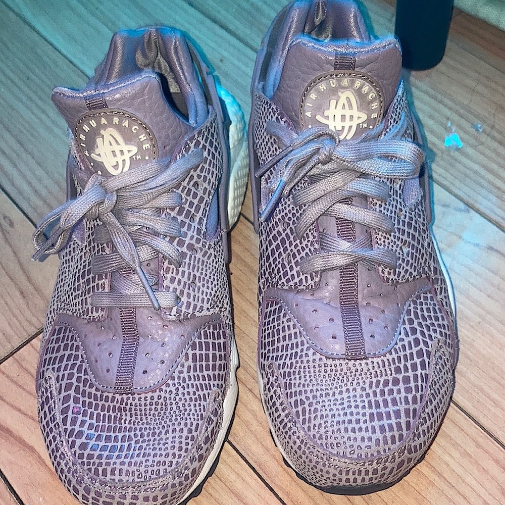 Lavender Nike Hurache sneakers.